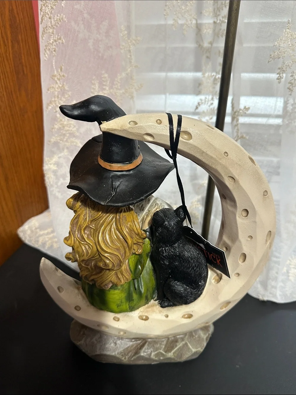 Broomstick blvd Halloween witch sitting on crescent moon